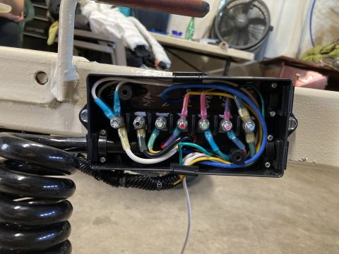 2015 Ford F-550 - Close-up of a trailer wiring junction box showing various electrical connections.