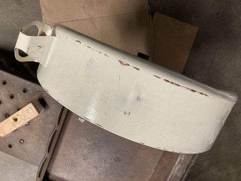 2015 Ford F-550 - A cream-colored bumper with visible rust spots is shown, suggesting it is a replacement part.