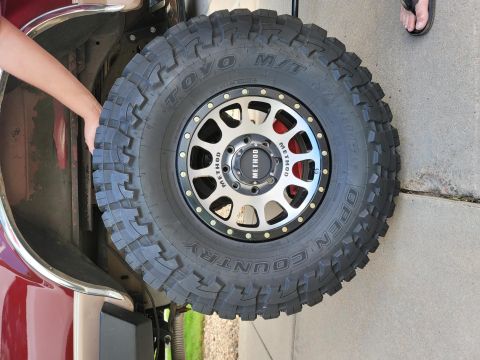 1996 Ford Bronco - Spare tire and wheel assembly with Method wheel and Toyo Open Country M/T tire.