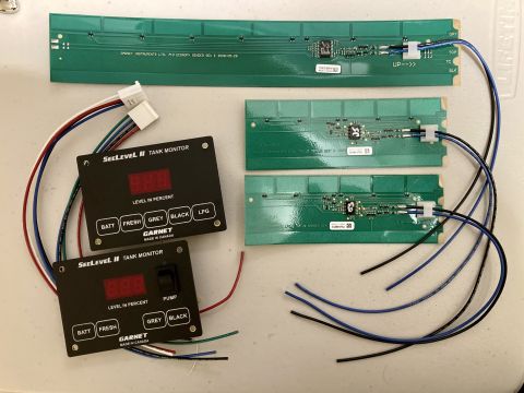 2015 Ford F-550 - Components for an RV tank monitoring system, including two digital displays and several circuit boards.