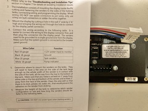 2015 Ford F-550 - Close-up of a circuit board with wiring and installation instructions visible on a document.