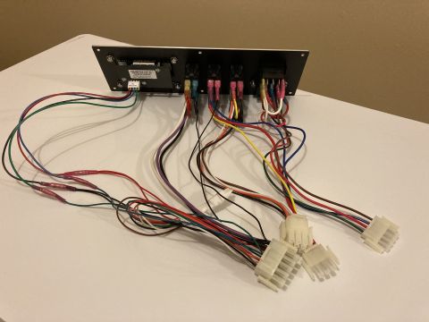 2015 Ford F-550 - A switch panel with a complex wiring harness is shown, likely for automotive or marine applications.