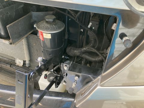 2015 Ford F-550 - Engine bay components visible, including a reservoir and radiator, with wiring harness.