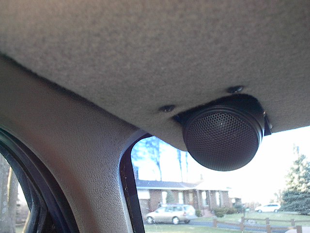 Right in front of your head.  Sounds better than sun visors do and at over 6'-4" who needs visors