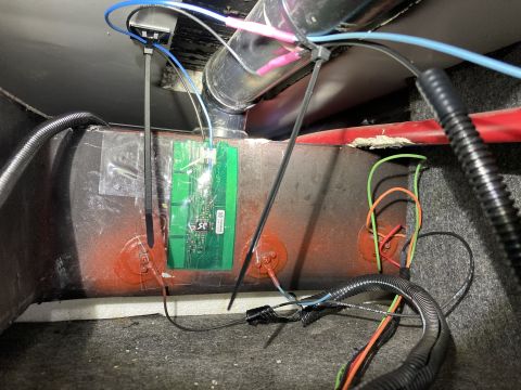 2015 Ford F-550 - Close-up of an electronic sensor and its wiring connected to a metal tank.