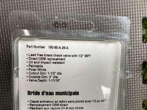 2015 Ford F-550 - This is packaging for a lead-free brass check valve, described as a direct OEM replacement, paintable, and polar white.