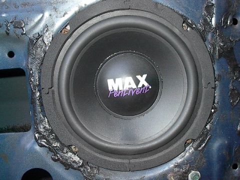 1986 Ford Bronco - 6 1/2" Mid range component speakers still required a little trimming of the stock door hole to fit.