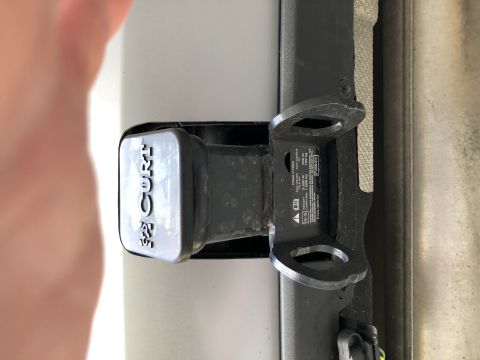 2019 Ford Everest - Close-up of a tow receiver hitch, CURT branding and a visible load rating sticker.