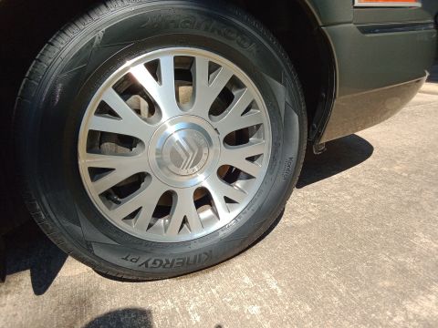 2003 Mercury Grand Marquis - My new Hankook Kinergy PT tires purchased yesterday.