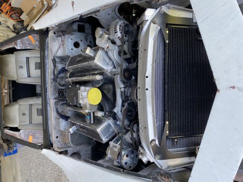 1976 Chevrolet Corvette engine bay with custom modifications