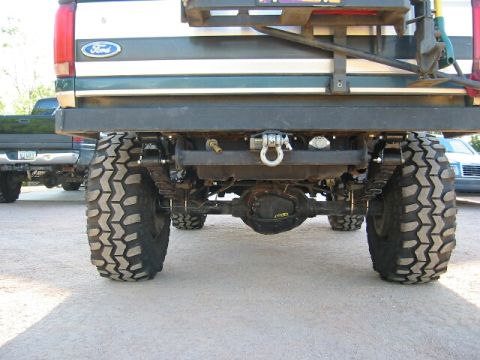 1994 Ford Bronco - Rear view of a modified 1994 Ford Bronco showing its heavy-duty suspension and axle setup.