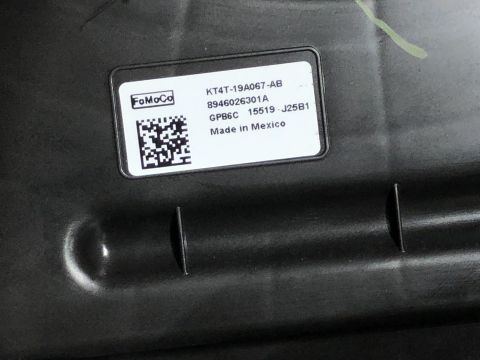 2019 Ford Everest - A label on a Ford part shows the part number and manufacturing location.