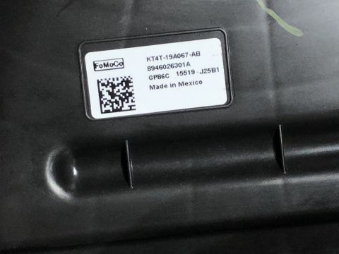 2019 Ford Everest - A close-up of a Ford part label with manufacturing details and a QR code.