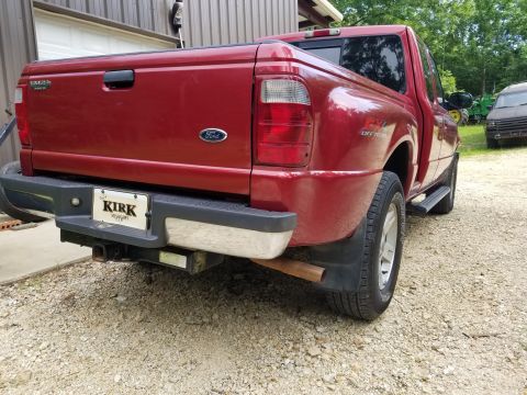 2003 Ford Ranger - No rust to mention, and the only body damage is a dimple on the right fender above the headlight.