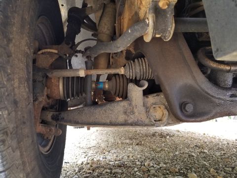 2003 Ford Ranger - The undercarriage shows no signs of off-roading or modification, but the sway bar end link bushings are shot.