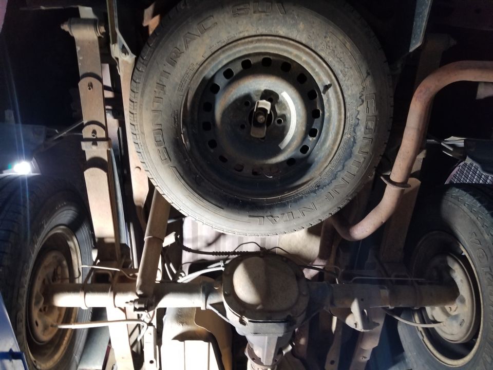 The undercarriage shows no signs of off-roading or modification.