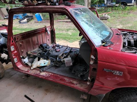 2003 Ford Ranger - The oppressive heat has slowed me down, but it's getting close. Right now, it's still drivable with A/C & no CEL.