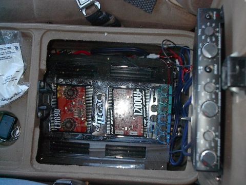 1986 Ford Bronco - First 4 channel amp is split to power all 4 tweeters. The other half powers both 6 1/2" mid ranger components in doors. Note old tech 6 cha…