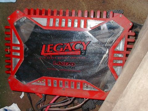 1986 Ford Bronco - This 4 channel amp, also controlled by the 6 channel crossover, is bridged to crank the two 10" component woofers in the rear.