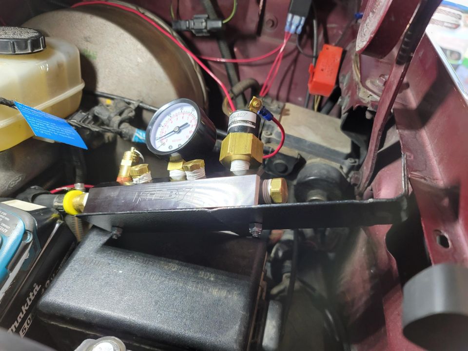 On-board air compressor gauge and fittings