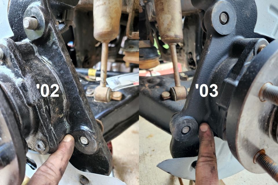 After reinstalling the tie rod end, A-arm, knuckle, & hub, I tried to put the brakes back on so I could roll the chassis. But the caliper bolts wouldn't line up...
IF THE IMAGE IS TOO SMALL, click it.

I knew the rotor hadn't grown, which only left the knuckle as the problem. When I compared it to the original, I saw the problem: Ford apparently offered small & large brakes on these trucks. Mine has large, but the JY knuckle I grabbed had small. Note that the debossments for the caliper bracket bolts merges with that for the hub on the '02 knuckle, but they're separate on the '03 knuckle.