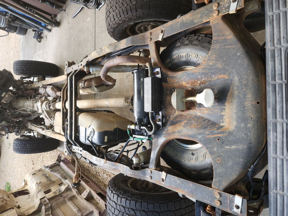 It's near the shadow of the engine, but the left frame rail is bent inward.
IF THE IMAGE IS TOO SMALL, click it.