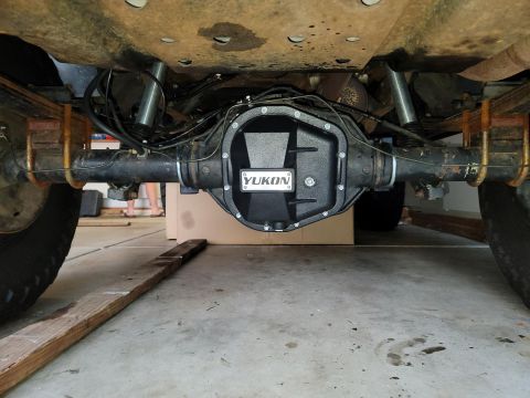 1996 Ford Bronco - Close-up view of a vehicle's rear axle and differential cover with 'Yukon' branding.