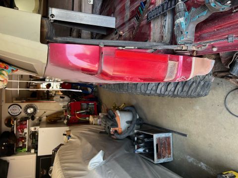 1995 Ford Bronco - This red Ford Bronco's body style suggests a 1992 model year, not 1995 as claimed.