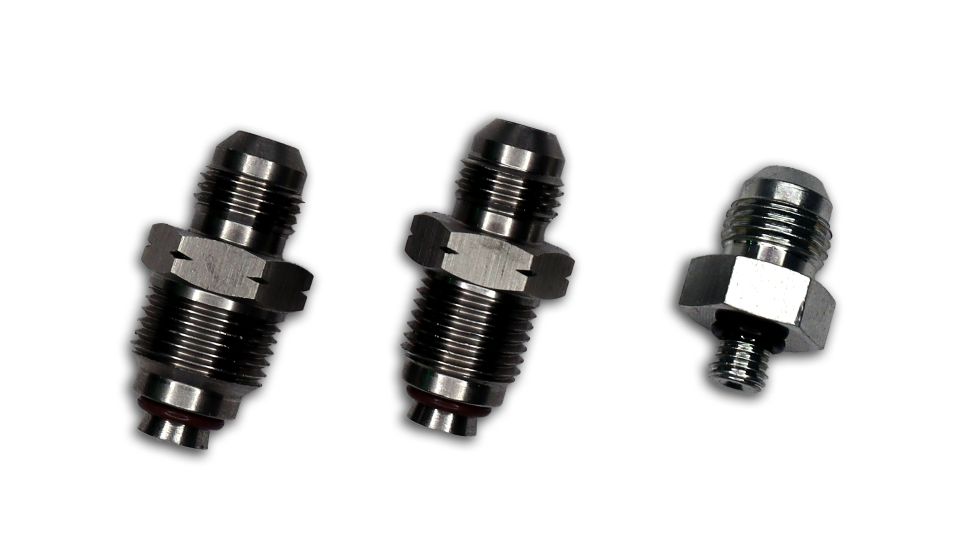 Three metal fittings of varying sizes, one smaller than the others