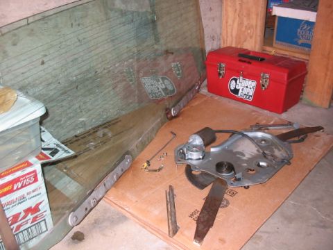 1995 Ford Bronco - motor, mechanism, glass, and misc. parts. 25 lbs. worth.