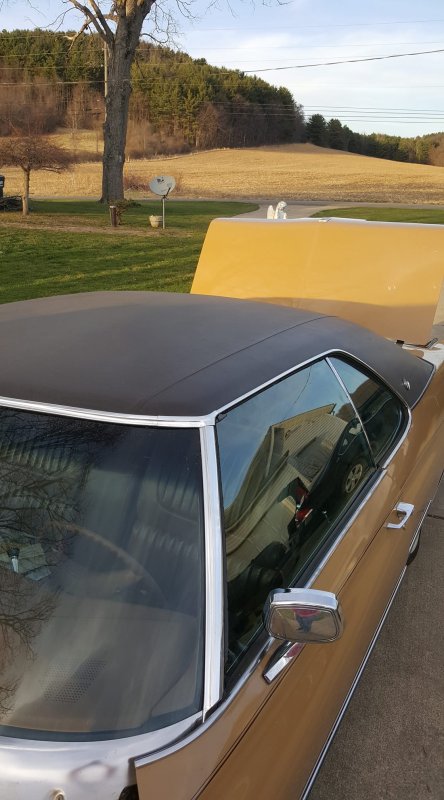 1972 Buick LeSabre - Side view of a 1972 Buick LeSabre coupe with its hood open, parked outdoors.