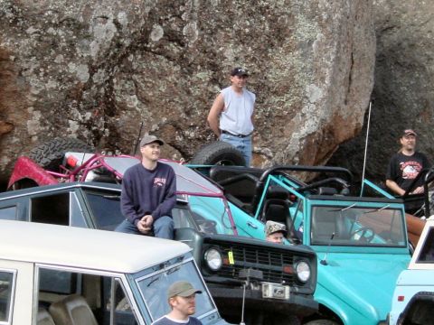 1973 Ford Bronco - Several off-road vehicles and people gathered at Katemcy Rocks in 2004.