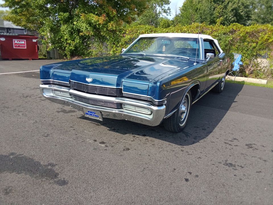 front view showing where I touched up the lower grille hiding the vertical bars. Although with the sun shining directly into the grille, it is not as apparent.