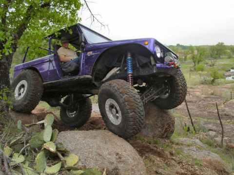 1973 Ford Bronco - Modified 1973 Ford Bronco navigating a rocky off-road course.