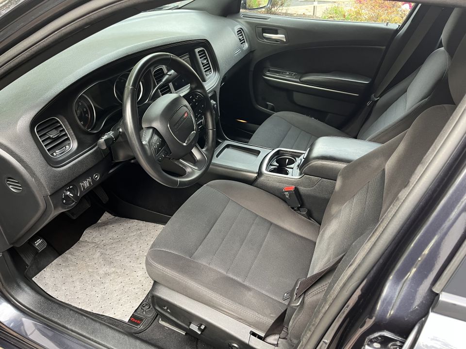 Front interior with steering wheel and seats of a Dodge Charger