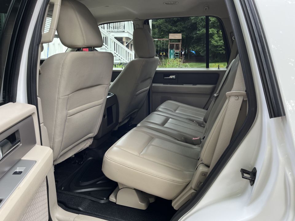 Second-row leather bench seat inside an SUV