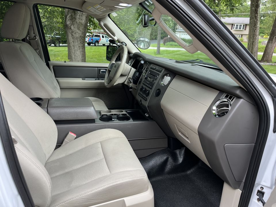 Interior view across front seats and dashboard of Ford Expedition