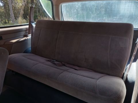 1994 Ford Bronco - Interior view of a vehicle's rear bench seat.