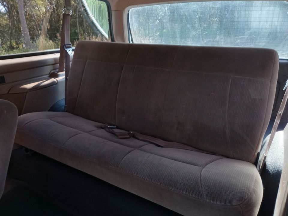 Rear bench seat inside a vehicle, fabric upholstery