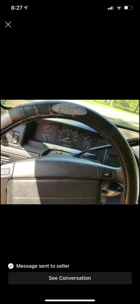 1994 Ford Bronco - Interior view of a Ford vehicle's dashboard and steering wheel, showing the instrument cluster.