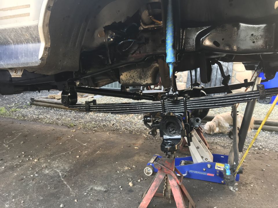 Front axle and leaf springs of a 1985 Ford F-350 undergoing rebuild