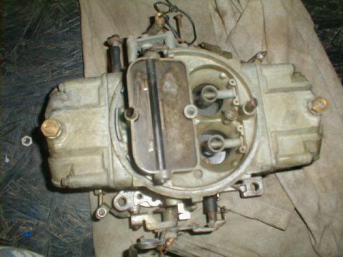 1967 Ford Mustang - Close-up view of a Holley carburetor, likely for a classic car.