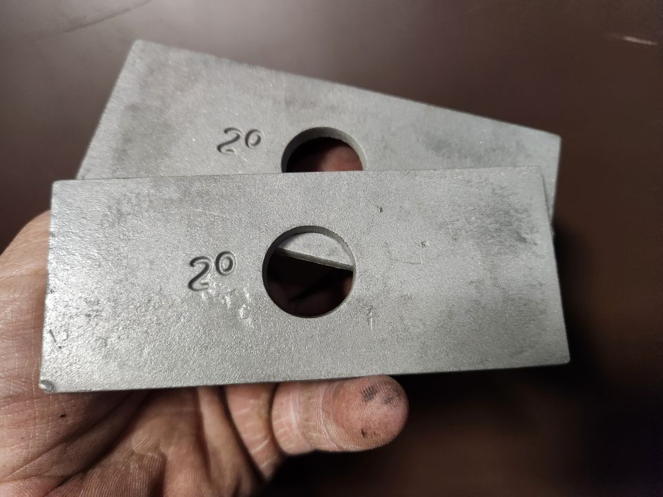 USED 2Â° (cast Aluminum) Leaf Spring Shims
IF THE IMAGE IS TOO SMALL, click it.