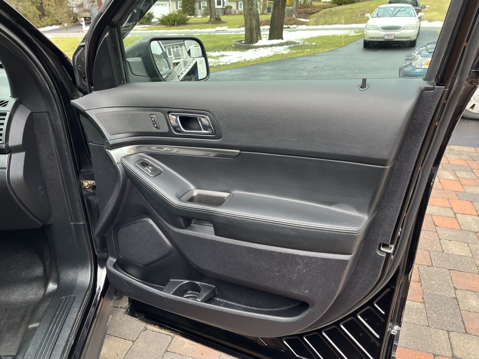 Open rear door showing door panel and trim