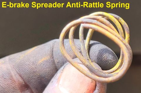 1983 Ford Bronco - The anti-rattle spring for the e-brake spreader bar naturally twists over time, causing it to bind & wear against the bar. Manually twist i…