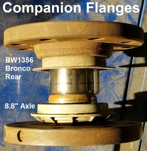 1983 Ford Bronco - Companion Flange Comparison IF THE IMAGE IS TOO SMALL, click it. The unthreaded transfer case flange has a wider collar than the axle flang…