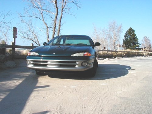 Front view of a dark green 1995 Dodge Intrepid parked outdoors