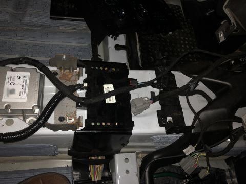 2016 Ford Explorer - add the center console brackets and small bolts, fits without modifications.
