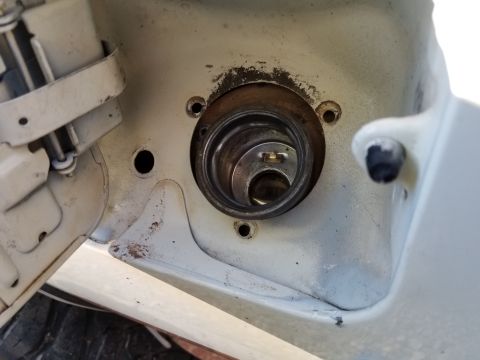 1983 Ford Bronco - Before lifting or tilting a Bronco body, remember to unattach the filler neck by removing these 3 screws, and sliding off the outermost hos…