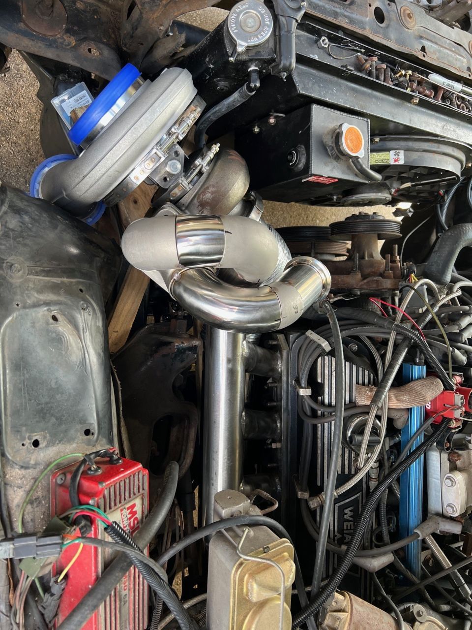 Driver's side header fully tacked up including the stub to the crossover pipe. I'll have to cut the tacks to the header to weld the stub first then weld the header to the flange last to have access for the TIG.